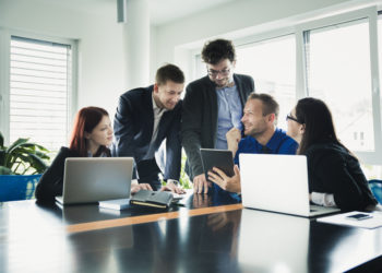 Group of People with laptops at the table