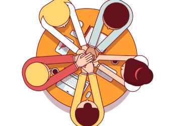 group of people at the table talking about project management software