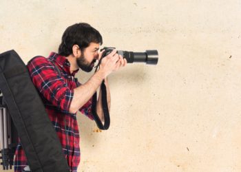 Photographer - a man taking the photo just started a photography business