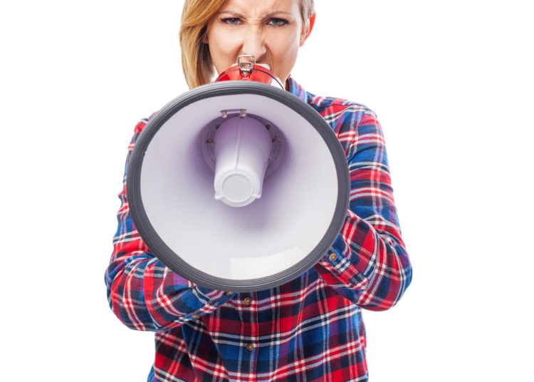 A woman with the megaphone