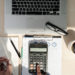 Close up businessman using calculator on documents Unrecognizabl