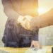 Good agreement between two Businessmen standing at the working place in city scape