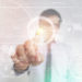 Asian Businessman Pressing High Tech Virtual Screen