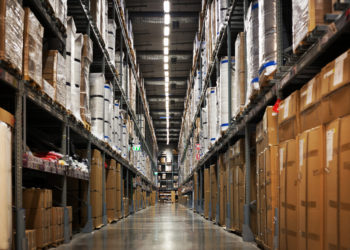 Warehouse Stock Rack With Box And Package In Logistic Industry Background