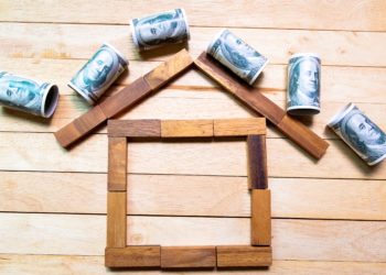 Wooden Block of House Shape, Home Financial Concept Top View