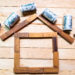 Wooden Block of House Shape, Home Financial Concept Top View