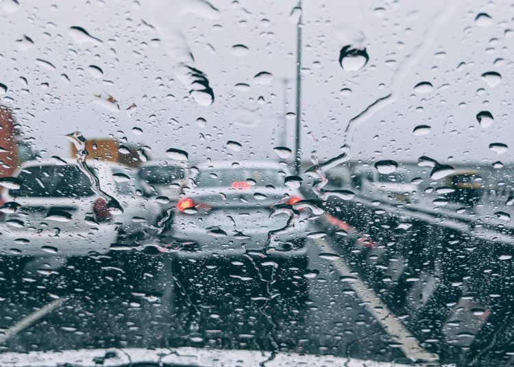 Traffic jam in the city during heavy rain
