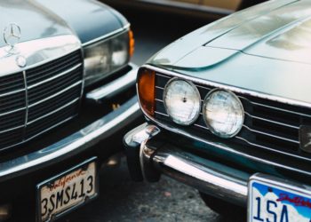 Two cars on the street, traffic in the city