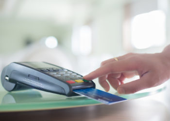 Woman hand with credit card for payment