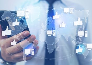 Like Network and Technology - Man Holding Smartphone Background