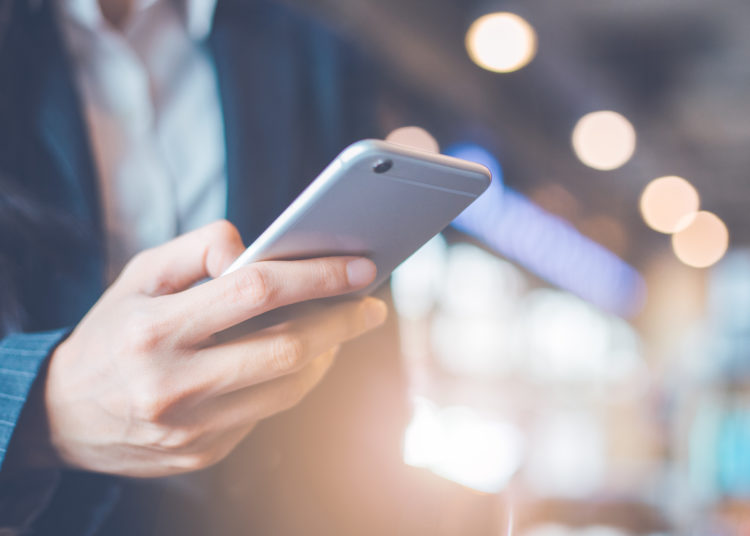 Business women hand are using smartphone.