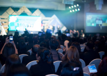 Disfocus of the convention hall background of busines