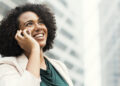 Happy businesswoman talking on the phone
