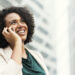 Happy businesswoman talking on the phone