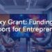 A diverse group of entrepreneurs working together in a modern office, with a galaxy-themed financial grant award displayed on a screen, inspiring and motivational atmosphere, vibrant colors, realistic.