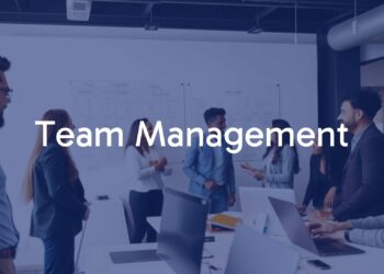 A diverse team collaborating in a modern office, smiling and working together, whiteboard with project plans, vibrant and professional atmosphere.