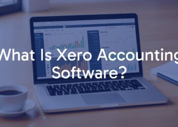 A modern laptop displaying Xero accounting software interface, clean and professional, with financial charts and graphs visible, workspace with coffee cup and notebook, bright and organized, digital finance theme.