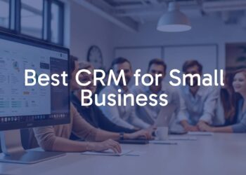 A small business workspace with a modern CRM dashboard on a computer screen, organized customer data, and a happy team collaborating, professional and clean.