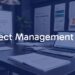 A modern office desk with a laptop, Gantt chart, and project management documents, professional and clean, realistic.