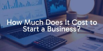 A modern business startup setup with a laptop, calculator, and financial charts on a desk, warm lighting, realistic.