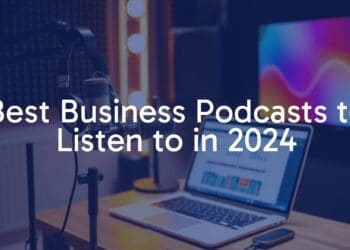 Modern podcast studio setup with a microphone, headphones, and a laptop showing business charts, vibrant and professional lighting, sleek and minimalist design.