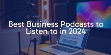 Modern podcast studio setup with a microphone, headphones, and a laptop showing business charts, vibrant and professional lighting, sleek and minimalist design.